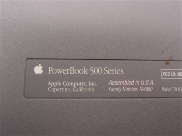 Apple PowerBook 500 Series bottom label showing Family Number M4880, Apple Computer Inc. Cupertino CA, Assembled in USA, rated 16.5V