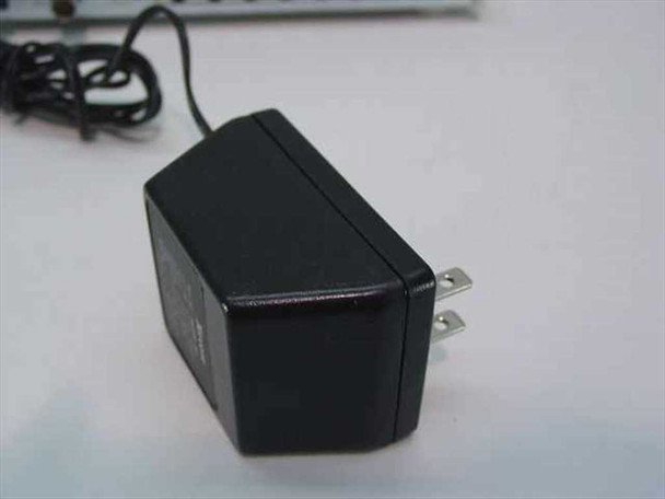 Black wall-mount power adapter included with 3Com 3C16701A OfficeConnect Hub