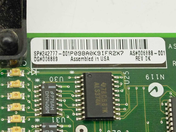 Compaq 242777-001 label close-up showing SP#242777-001, AS#006888-001, DG#006889, Rev OK, and Assembled in USA barcode