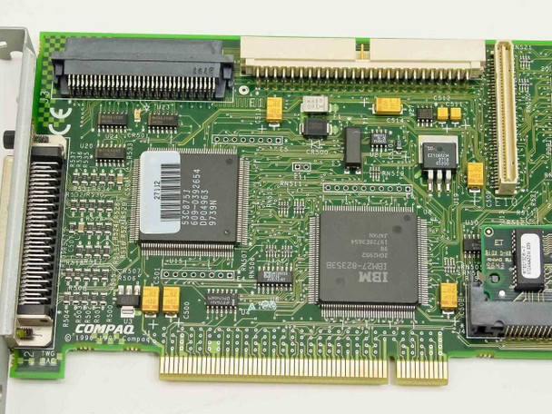 Compaq Smart-2SL controller card close-up – IBM main ASIC and Compaq logo visible on PCB near PCI edge connector