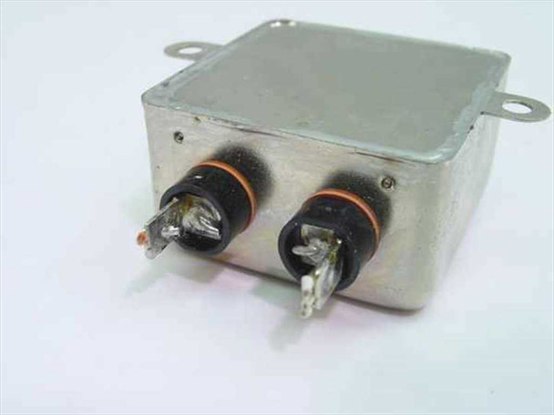 Corcom F7143 10VK1 EMI filter – rear/bottom view showing dual load terminal posts and mounting flanges