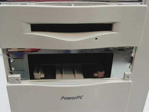 Apple Power Macintosh 8500/180 front drive bay detail — empty Zip drive bay visible below CD-ROM, PowerPC label on bezel