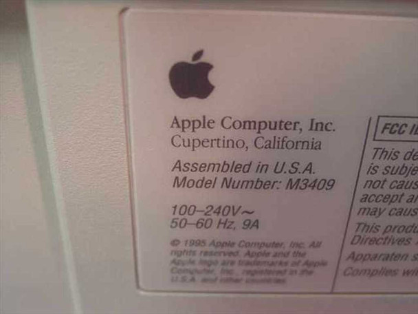 Apple Power Macintosh 8500/180 rear label showing model number M3409, 100-240V 50-60Hz 9A, assembled in USA