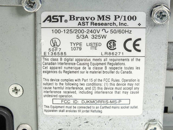 AST Bravo MS P/100 rear rating plate showing AST Research Inc., 100-125/200-240V 50/60Hz 5/3A 325W, UL CSE CE certifications, FCC ID DJKMORRIS-MS-P