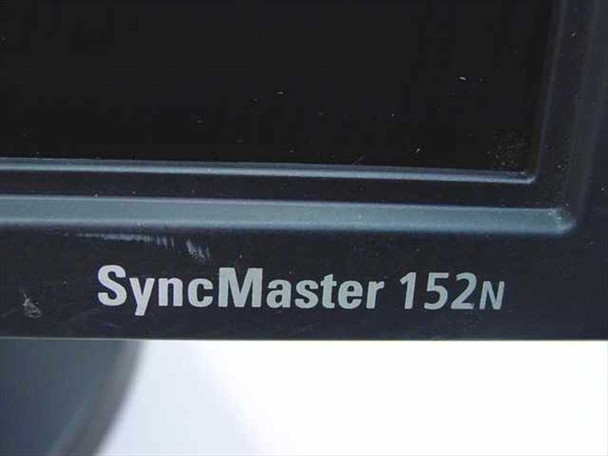 Close-up of Samsung SyncMaster 152N model name badge on lower bezel, showing light surface marks on the plastic bezel
