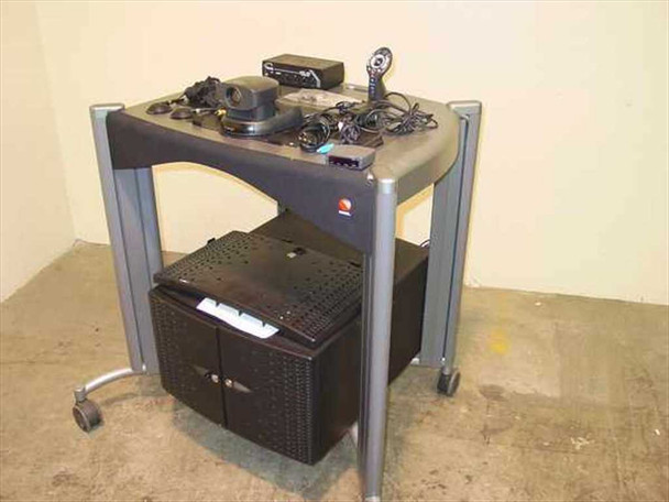 VTEL WG500 video conferencing system on rolling AV cart with Sony EVI-D30 PTZ camera and components on top shelf, PC enclosure on lower shelf — front left view