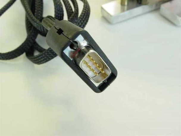 Thales Cryogenics RM5-61/03 – close-up of multi-pin gold-contact connector on braided cable, black housing with 9-pin gold contact array