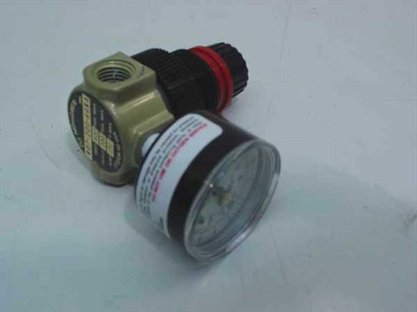 Norgren R07-200-RGKA mini air pressure regulator with GC620 gauge attached — front-angle view showing body label and red-ring adjustment knob