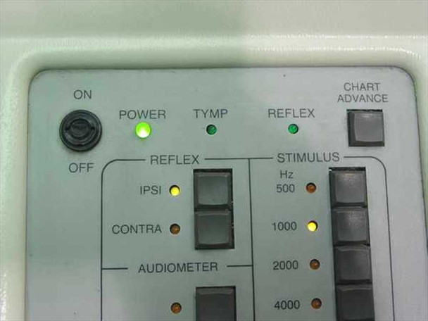 GSI 28 Auto Tymp control panel close-up showing ON/OFF switch, POWER, TYMP and REFLEX indicator lights, IPSI, CONTRA, AUDIOMETER buttons, and STIMULUS frequency selector