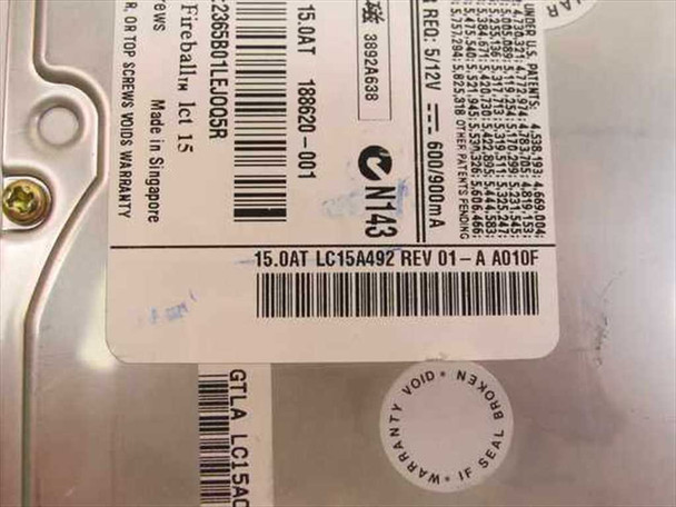 Quantum Fireball lct 15 drive label close-up showing model LC15A492 REV 01-A A010F, 15.0AT, 186620-001, Made in Singapore, and power requirements 5V/12V 600/900mA
