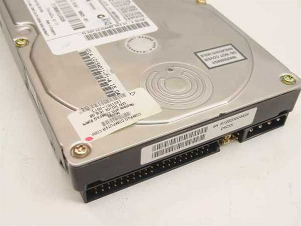 Quantum Fireball lct 15 15GB 3.5-inch IDE hard drive top view showing Compaq OEM label with part number 201761-001 and IDE connector