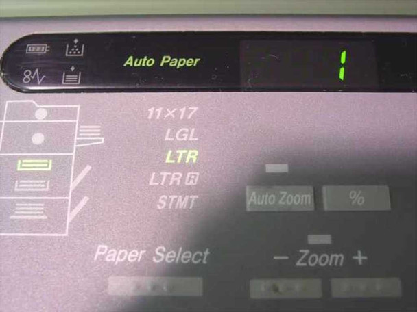 Canon NP6221 control panel close-up showing Auto Paper display, Paper Select buttons, paper size indicators (11x17, LGL, LTR, STMT), and Zoom controls