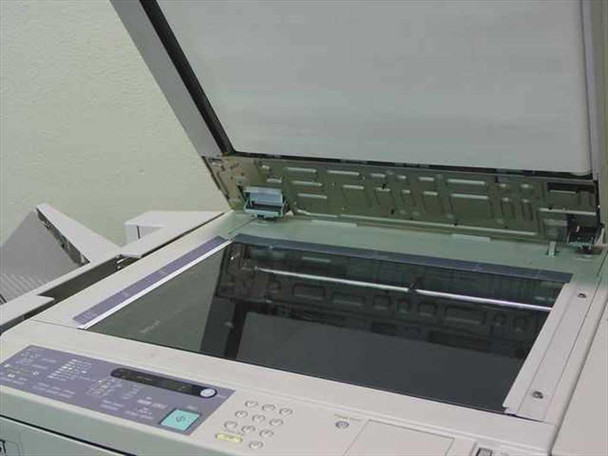 Canon NP6221 platen glass and ADF open, showing scanner glass surface, document feeder mechanism, and front control panel keypad