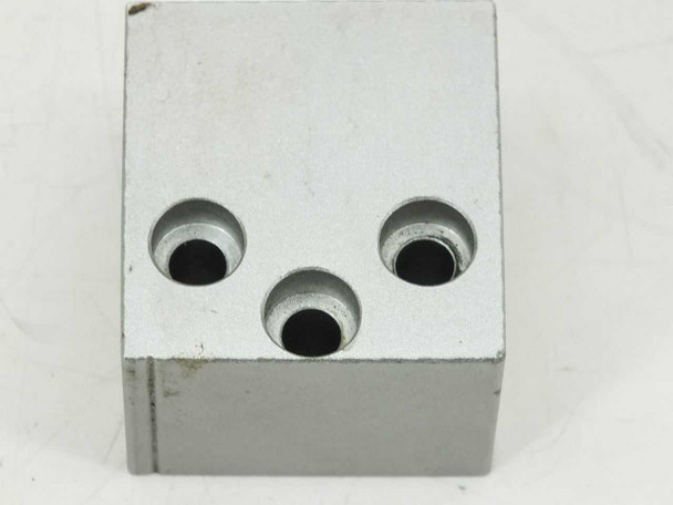 SMC MY1H25G-300H-Z73L cylinder – bottom port face showing three pneumatic port openings in aluminum block