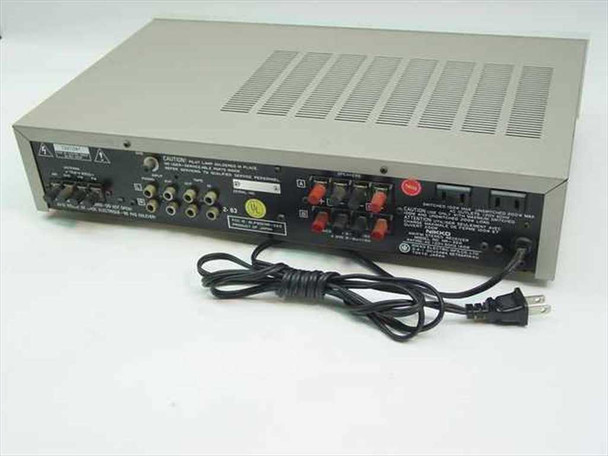 Nikko NR-320 AM/FM Stereo Receiver – rear panel overview showing RCA inputs, speaker terminals, AC outlets, and power cord