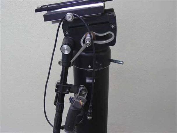 QuickSet Hercules pan-tilt head side detail – control arm, cable routing, tilt drag adjustment knob, and mounting hardware visible on right side of head assembly