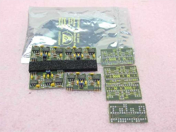 Accessory bag contents showing one populated daughter module in anti-static bag, two additional populated daughter boards, and four unpopulated PCBs