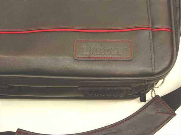 Targus logo patch close-up on black leather-look laptop case with red accent stitching