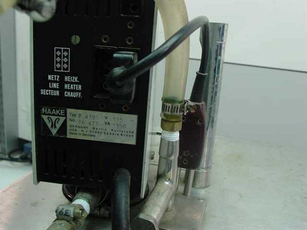 Haake F 4391 rear panel — type label showing Typ F 4391, V 115, VA 1000, Haake logo, made in Germany; dual power switches (Netz/Line and Heizk./Heater); flexible circulation hose and fittings visible