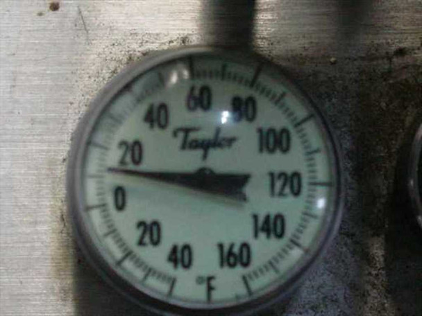 Close-up of Taylor dial thermometer on Haake F 4391 tank lid — scale reads 0 to 160°F; needle resting near 13°F indicating cold/ambient reading at time of photo