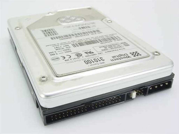 Western Digital AC310100 10.1GB IDE hard drive – rear angled view showing 40-pin IDE connector, 4-pin power connector, and jumper block