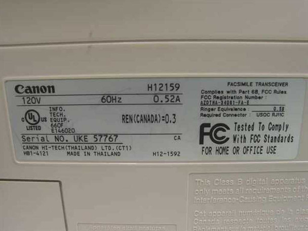 Canon MultiPass C530 bottom label showing model H12159, 120V 60Hz 0.52A rating, FCC registration, REN Canada 0.3, serial number UKE 57767, Made in Thailand