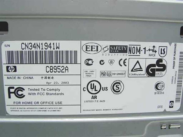HP Deskjet 3820 bottom label showing model C8952A, serial number CN34N1941W, manufacture date April 23 2003, FCC compliance, and regulatory markings