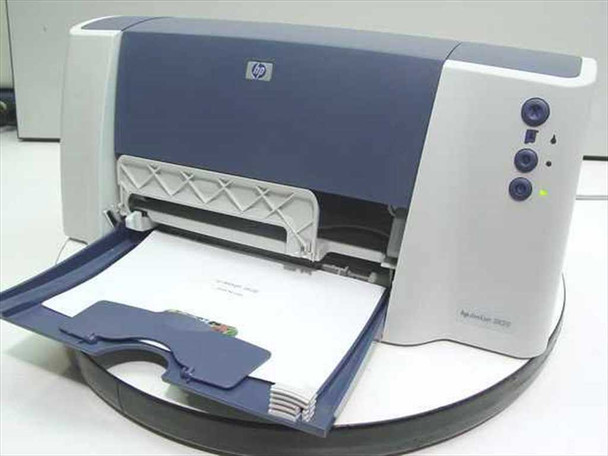 HP Deskjet 3820 color inkjet printer — front three-quarter view with paper tray open and paper loaded