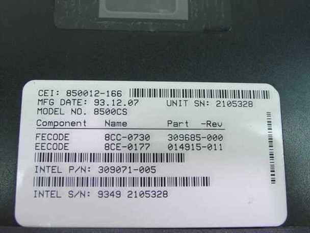 Exabyte EXB-8500CS bottom label showing model 8500CS, MFG date 93.12.07, CEI P/N 850012-166, Intel P/N 309071-005, unit SN 2105328, FECODE and EECODE component details