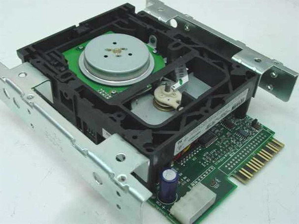 Irwin 31250A Accutrak tape drive – open top view showing tape transport mechanism, capstan motor, and controller PCB with edge connector