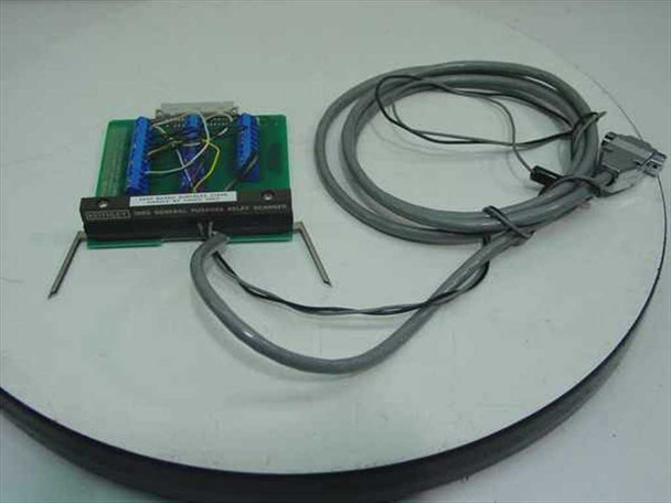 Keithley 7055 General Purpose Relay Scanner Card shown removed from chassis alongside a GPIB interface cable