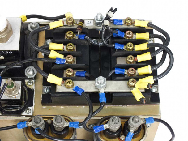 Top-down view of heat sink assembly – showing terminal blocks, IGBT gate connections, yellow and blue wiring connectors, and bus bars