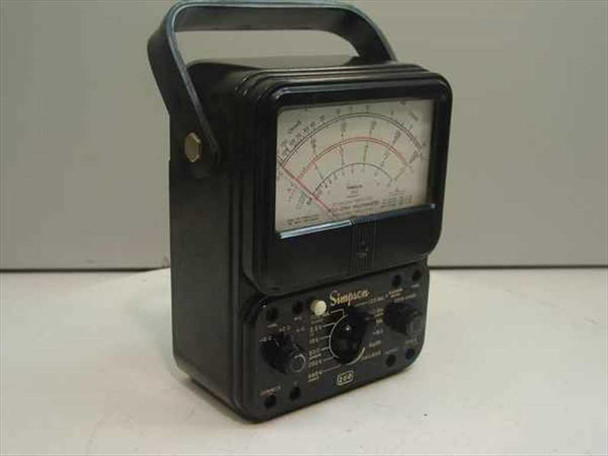 Simpson 260 Series 6P VOM analog multimeter — front three-quarter view showing tri-color mirrored dial, two range selector knobs, Simpson logo, and black phenolic case with carry handle
