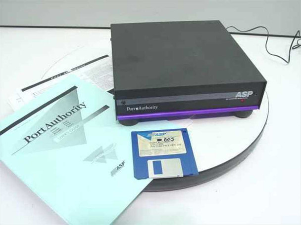 ASP Computer Products PA1600 Port Authority print server – top/front view with included manual and software floppy disk