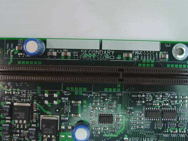 Intel 681234-509 motherboard — close-up of Slot 1 connectors labeled Secondary Processor and Primary Processor on PCB silkscreen