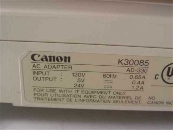 Canon BJC-4200 K30085 rating label showing AC Adapter AD-330, Input 120V 60Hz 0.65A, Output 5V 0.4A and 24V 1.2A