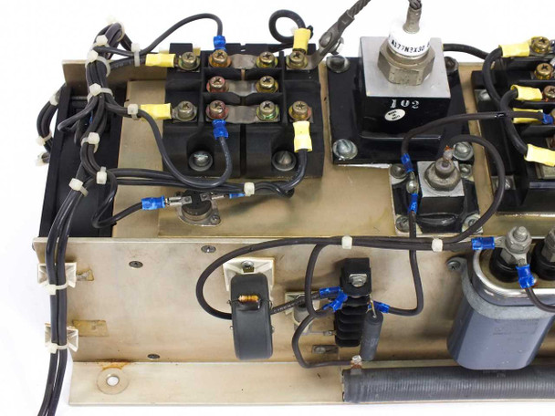 Heat sink assembly – close-up of terminal bus bars, current transformer, and high-voltage interconnects with yellow and blue wiring connectors