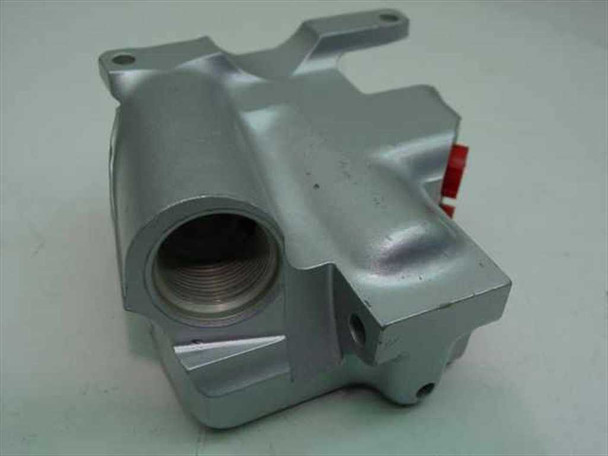 Angled front view of aluminum valve body 14-43451-1 showing threaded inlet bore and mounting flanges