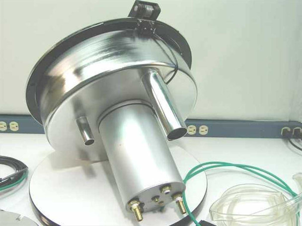 Headway Research CB15 motor/bowl assembly side view — stainless steel bowl, cylindrical motor body with vacuum ports and brass fittings, green tubing attached