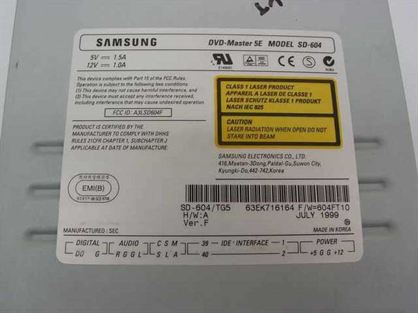 Samsung SD-604 label showing model SD-604/TG5, 5V 1.5A / 12V 1.0A power ratings, IDE interface, Master SE jumper, Ver. F hardware revision, July 1999 manufacture date, Made in Korea