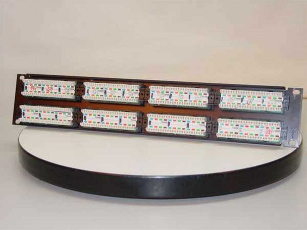 AMP NetConnect 406331-1 Cat 5e 48-Port Patch Panel — rear view showing 110-style punch-down blocks with color-coded wiring guides for all 48 ports