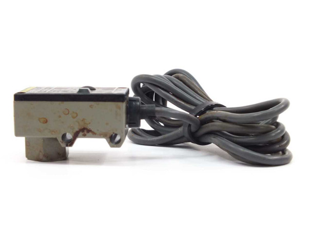Omron E8EB-01C pressure sensor side view showing surface corrosion and rust staining on housing body