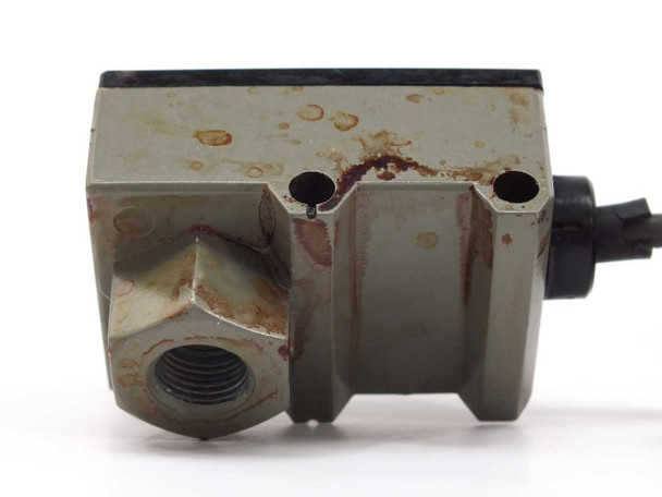 Omron E8EB-01C pressure sensor bottom/port view showing threaded pressure port and significant rust and corrosion on mounting face