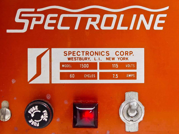 Spectroline 1500 rating plate closeup — Spectronics Corp Westbury NY label showing Model 1500, 115 Volts, 60 Cycles, 7.5 Amps; fuse holder and red power indicator visible