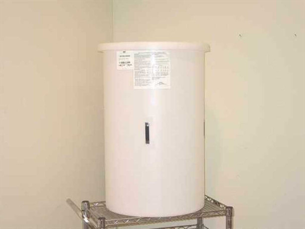 Norton Performance Plastics 54100-0055 55-gallon white HDPE flat-bottom cylindrical tank with cover, label on side, shown on wire shelf — cart not included