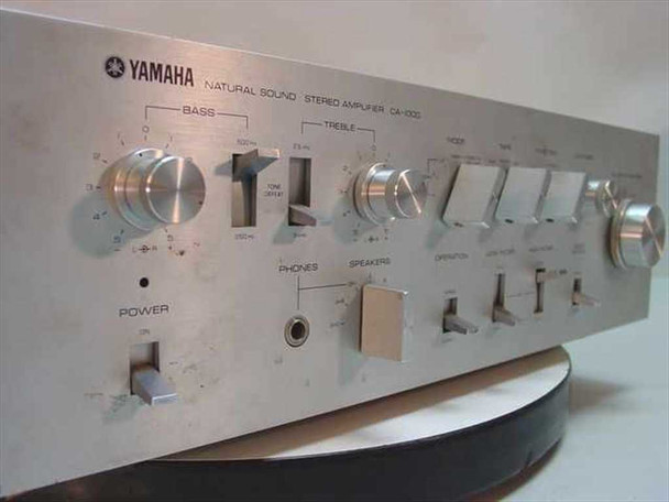 Yamaha CA-1000 front panel close-up — Bass, Treble knobs, Tone Defeat, Phones jack, Speakers and Operation selector switches