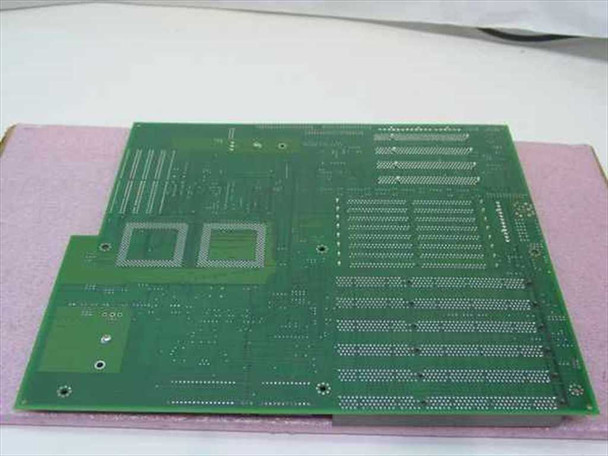 AMI Titan-II motherboard bottom/solder side view showing dual CPU socket footprints and EISA/PCI slot traces