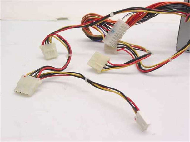 Component Pro ATX-250N 250W ATX power supply — close-up of Molex 4-pin peripheral drive connectors and 20-pin ATX motherboard connector on wire harness