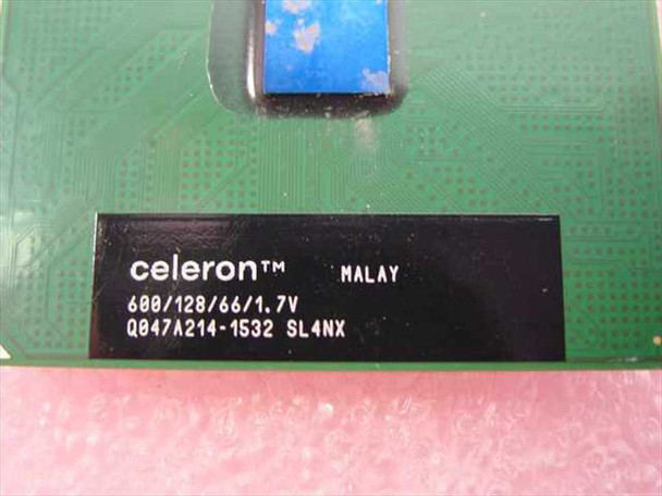 Intel Celeron SL4NX CPU close-up of specification label showing 600/128/66/1.7V and lot code Q047A214-1532