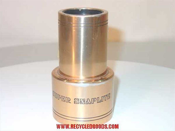 Kollmorgen BX241 Super Snaplite 35mm projection lens — front three-quarter view showing gold brass barrel with 'Super Snaplite' engraving and silver inner tube